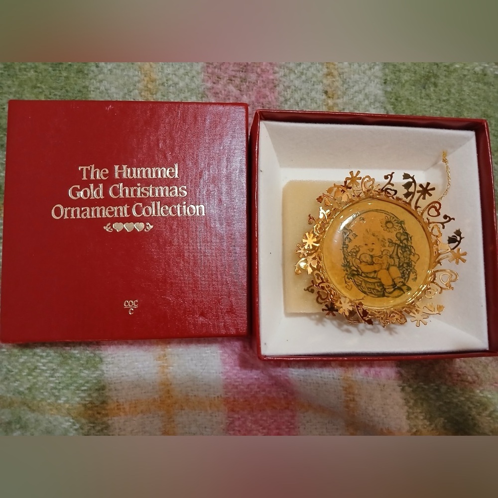 Hummel Gold Ornament with Intricate Design